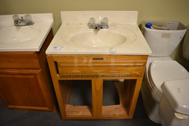 Bathroom Sink w/ Faucet, Handles. Missing 2 Wood Pattern Doors. 25x20x34. (room 102)
