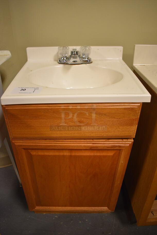 Bathroom Sink w/ Faucet, Handles. and Wood Pattern Door. 19x17x34. (room 102)