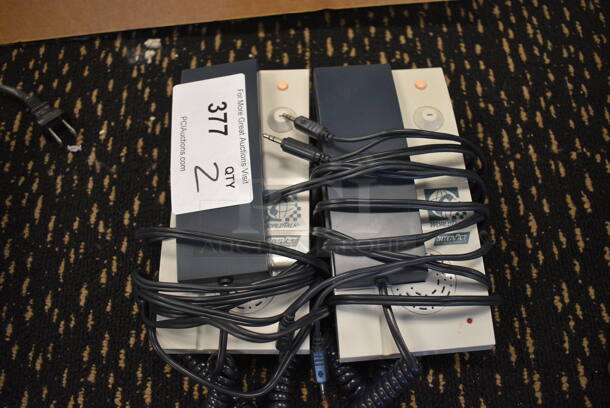 2 InterAct WorldTalk Phones. 4x8x2.5. 2 Times Your Bid! (room 204) - Image 1 of 4
