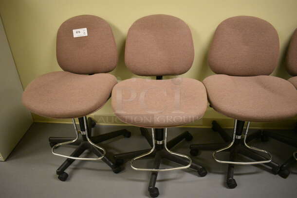 10 Office Chairs on Casters. 22x22x36. 10 Times Your Bid! (south basement hallway by 022)