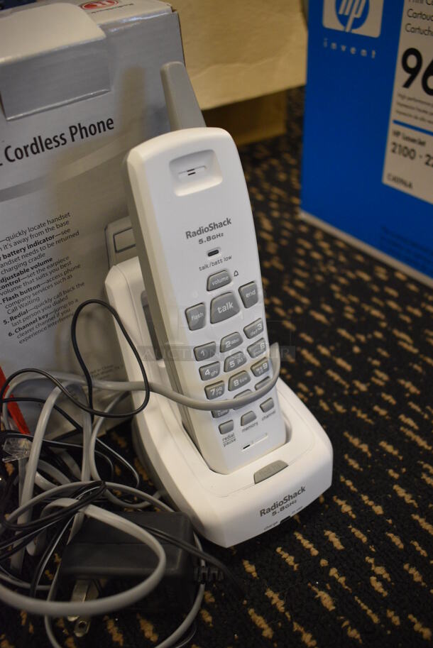 IN ORIGINAL BOX! RadioShack Phone in Cradle. 3.5x4x8.5. (room 204) - Image 2 of 3