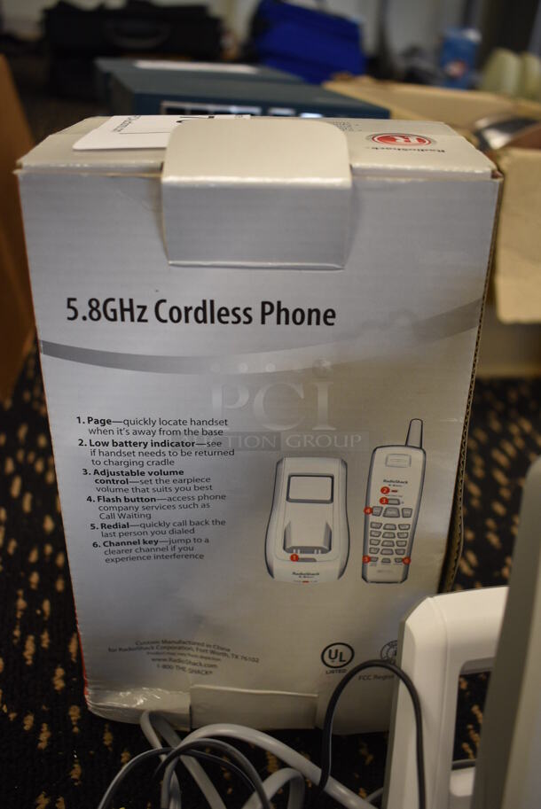 IN ORIGINAL BOX! RadioShack Phone in Cradle. 3.5x4x8.5. (room 204) - Image 3 of 3