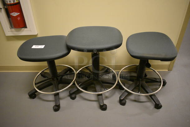 3 Office Stools on Casters. 24x24x22. 3 Times Your Bid! (south basement hallway by 022)