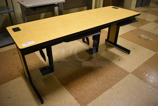 Table. 71.5x23.5x29.5. (room 108a)