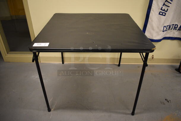 Black Metal Folding Card Table. 33.5x33.5x28. (north basement 004)