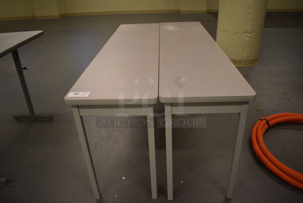 2 Gray Tables. 71.5x17.5x29. (south basement 017)