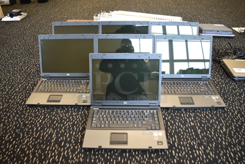 7 HP Compass 6715b 15.5" Laptops. 7 Times Your Bid! (room 204)