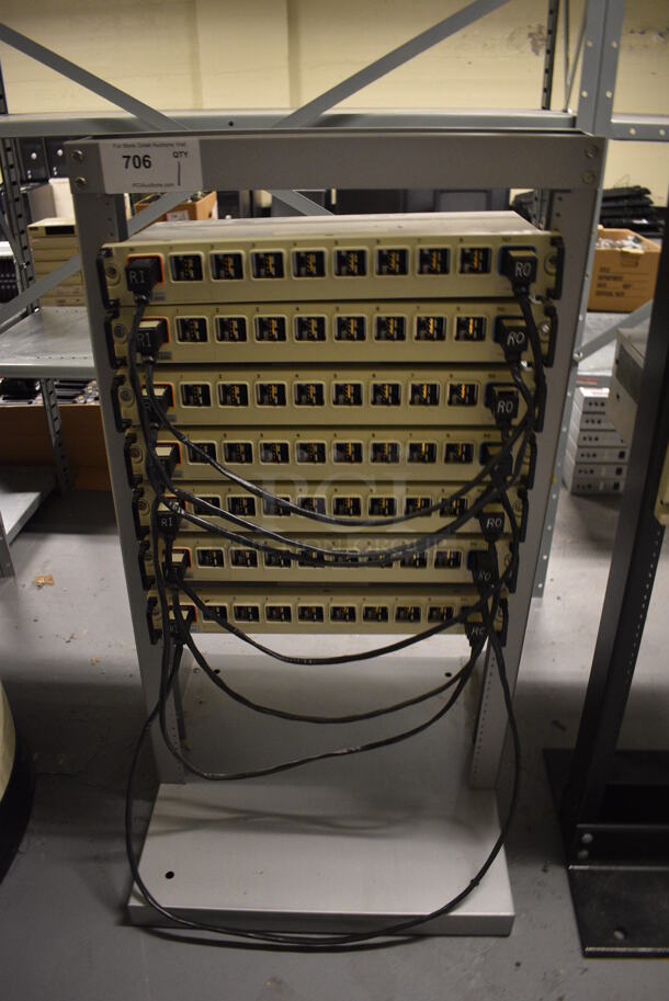 Gray Metal Rack w/ 7 IBM Rack Units. 21x21x39.5. (south basement 012)