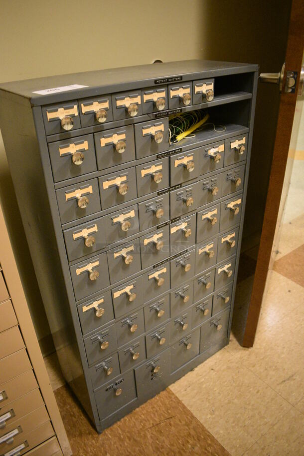 Gray Metal 19 Drawer Filing Cabinet w/ Contents. BUYER MUST REMOVE: Give Yourself Ample Time To Remove This Item on Pick Up Day. 25.5x10.5x43.5. (room 108a) - Image 2 of 11