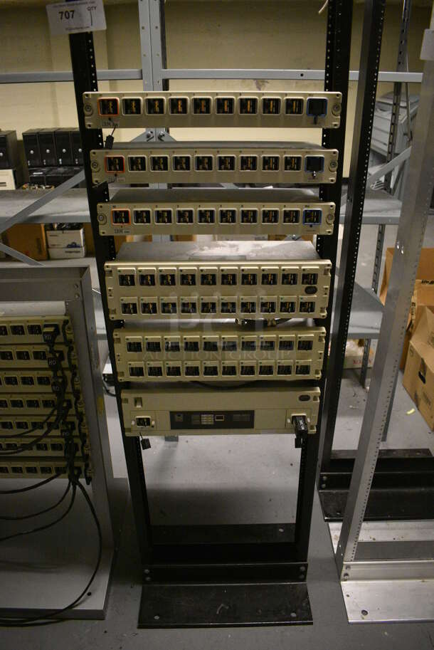 Gray Metal Rack w/ 5 IBM Rack Units. 20x15x84. (south basement 012)