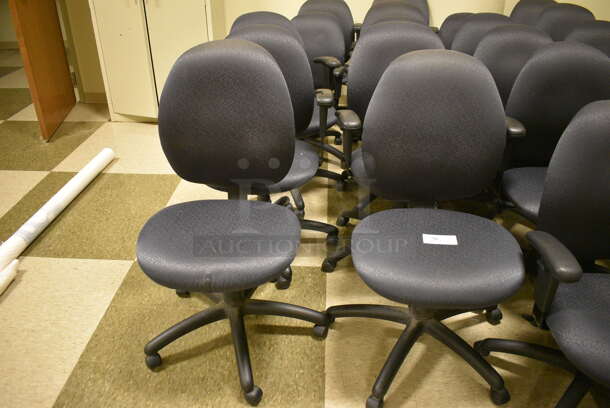 10 Office Chairs on Casters. Two Are Missing Arm Rests. 21x22x40, 24x21x40. 10 Times Your Bid! (room 103)