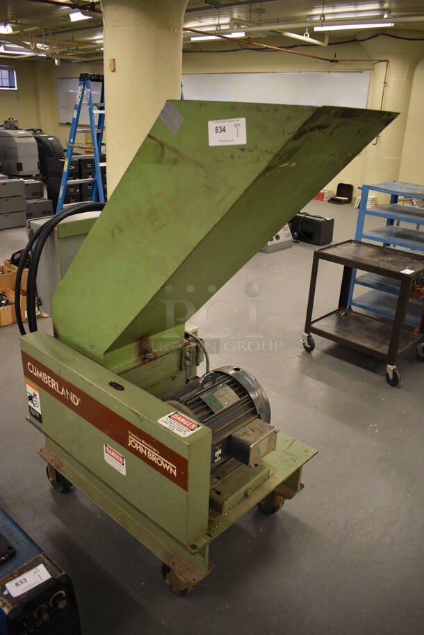 John Brown Plastics Machinery Cumberland Green Metal Floor Style Wood Chipper on Casters. 230 Volts, 3 Phase. BUYER MUST REMOVE: Give Yourself Ample Time To Remove This Item on Pick Up Day. 25x50x56. (south basement 019)