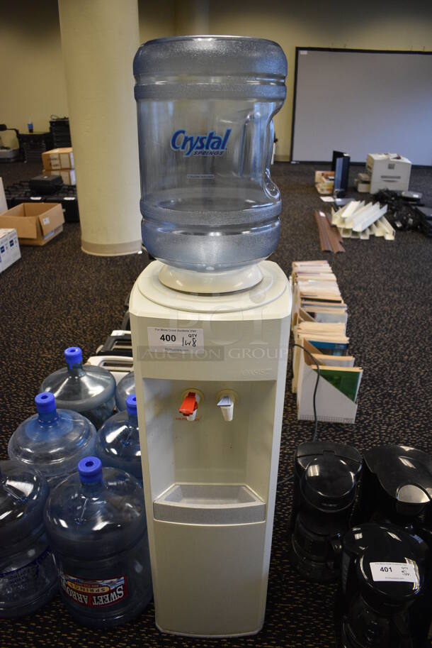 ALL ONE MONEY! Lot of Model B1SRHS-L202 Water Cooler w/ 8 Blue Water Jugs. 12x12x56. (room 204)