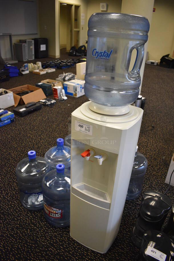 ALL ONE MONEY! Lot of Model B1SRHS-L202 Water Cooler w/ 8 Blue Water Jugs. 12x12x56. (room 204) - Image 2 of 5