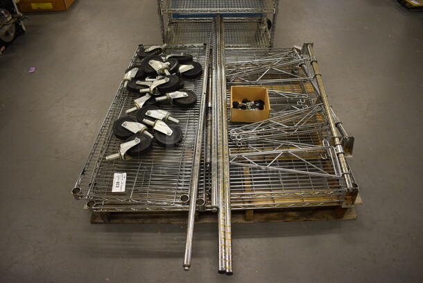 ALL ONE MONEY! Lot of 6 Chrome Finish Shelves, 16 Commercial Casters, 6 Poles and 2 Poles w/ Brackets! Includes 48x18x1.5. (south basement 019)