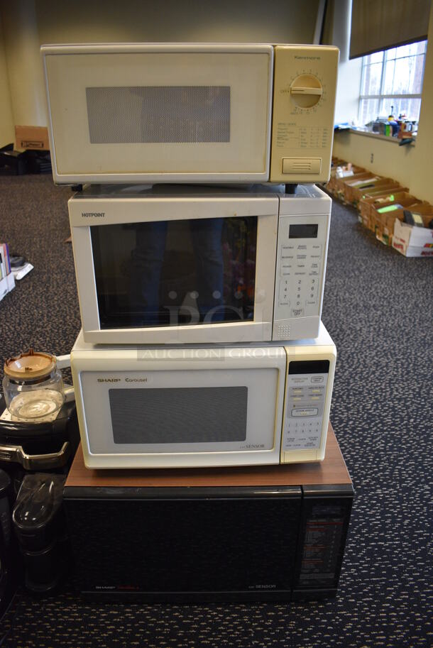 4 Various Microwaves Including Kenmore, Hotpoint and Sharp. Includes 24x18x14. 4 Times Your Bid! (room 204)