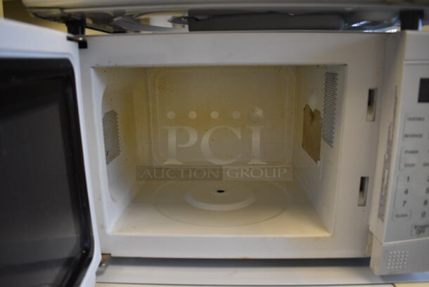 4 Various Microwaves Including Kenmore, Hotpoint and Sharp. Includes 24x18x14. 4 Times Your Bid! (room 204) - Image 5 of 10
