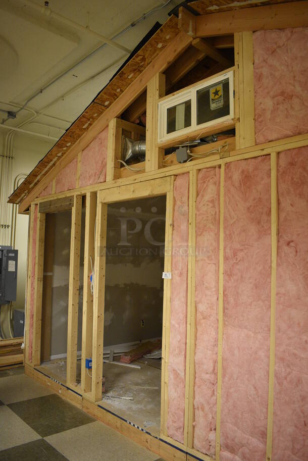 Wooden Small Demo House Frame w/ Insulation, Windows, Ruud Unit, Square D Switch. BUYER MUST REMOVE: Winning Bidder Will Have To Contact HACC To Make an Appointment To Remove This Item Between May 6th and May 13th. 24'X12'X12.5'. (room 103) - Image 3 of 12