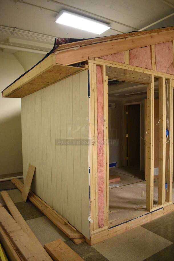 Wooden Small Demo House Frame w/ Insulation, Windows, Ruud Unit, Square D Switch. BUYER MUST REMOVE: Winning Bidder Will Have To Contact HACC To Make an Appointment To Remove This Item Between May 6th and May 13th. 24'X12'X12.5'. (room 103) - Image 9 of 12