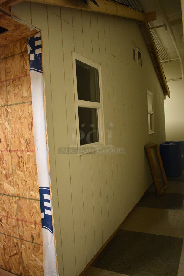 Wooden Small Demo House Frame w/ Insulation, Windows, Ruud Unit, Square D Switch. BUYER MUST REMOVE: Winning Bidder Will Have To Contact HACC To Make an Appointment To Remove This Item Between May 6th and May 13th. 24'X12'X12.5'. (room 103) - Image 12 of 12