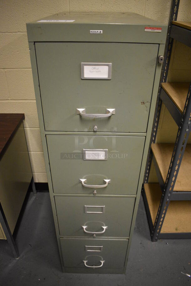 Cole Green Metal 4 Drawer Filing Cabinet. 15x27x52.5. (south basement 024)