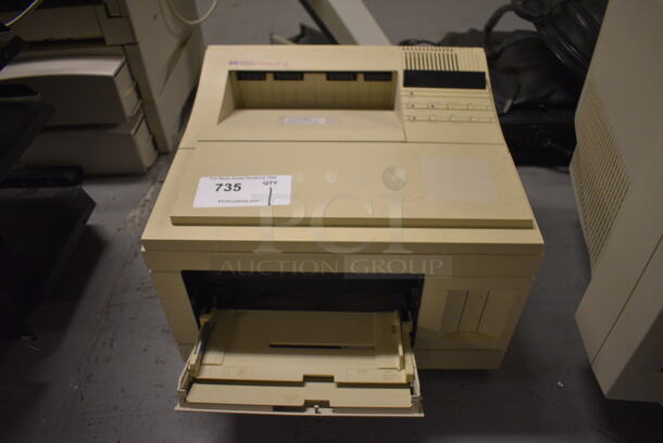 HP LaserJet 4 Countertop Printer. 16.5x20x12. (south basement 012)