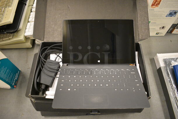 4 Windows 8 Pro Surface Tables w/ 1 Keyboard. 10.5" Screen. 4 Times Your Bid! (south basement 019) - Image 3 of 5