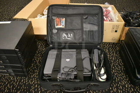 Dell Latitude 13.5" Laptop in Soft Case. (room 204)