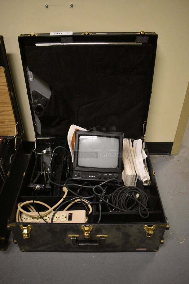 Hitachi Monitor in Case. 24.5x21.5x11.5. (south basement 024)