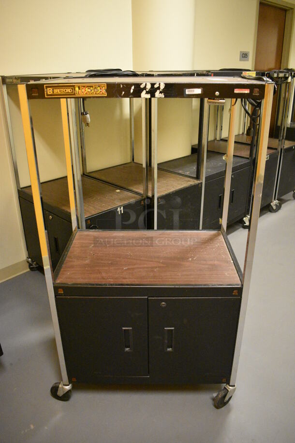 3 Metal AV Cart on Commercial Casters. 31x20x54, 31x23x54. 3 Times Your Bid!  (south basement hallway by 022)