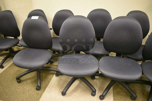 9 Black Office Chairs on Casters. 21x20x36. 9 Times Your Bid! (room 105)