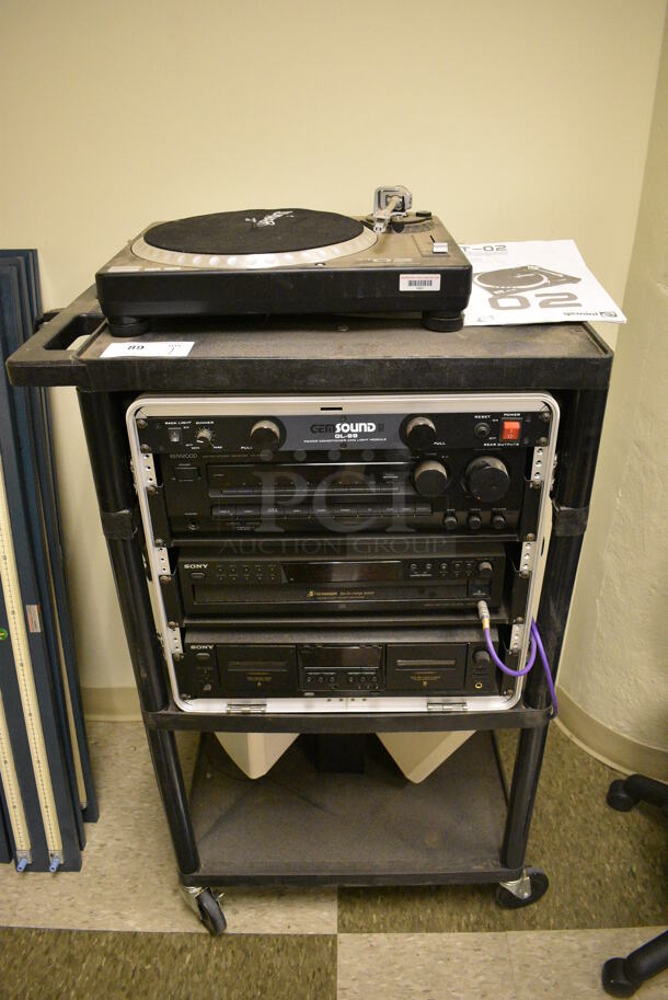 Black AV Cart w/ Gemini TT02 Full Manual Direct Drive Turntable Record Player, GEM Sound GL-99 Power Conditioner and Light Module, Sony Disc Player and 2 JBL Speakers on Commercial Casters. 27x18x45