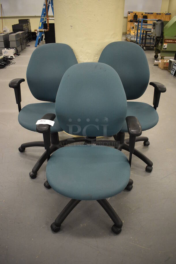 3 Teal Office Chair w/ Arm Rests on Casters. 23x23x38. 3 Times Your Bid! (south basement 019)