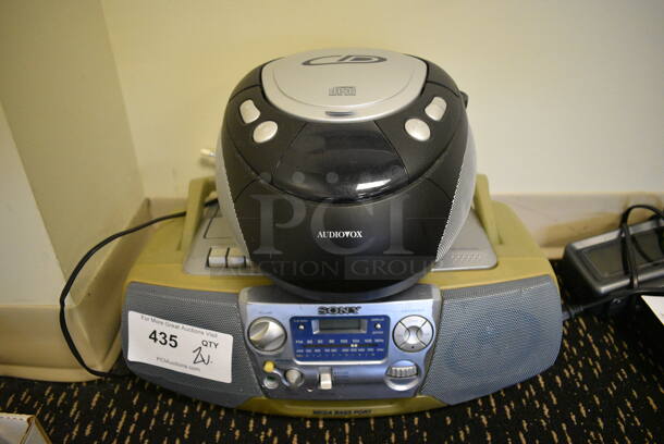 2 Various Radios; Audiovox and Sony. 9x10x6, 17x10x6. 2 Times Your Bid! (room 204)