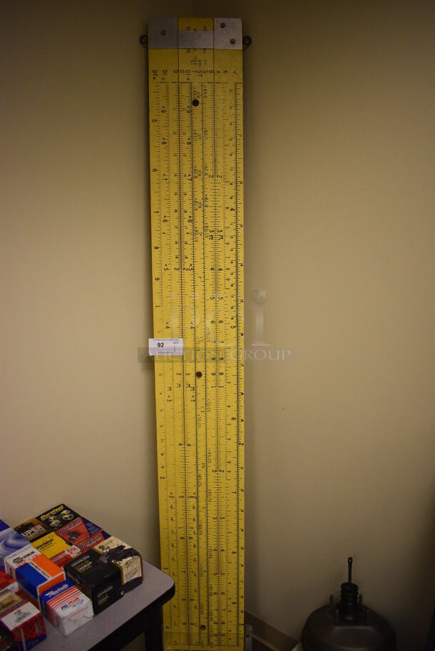 Yellow Measuring Board. 84x1x12. (room 105)