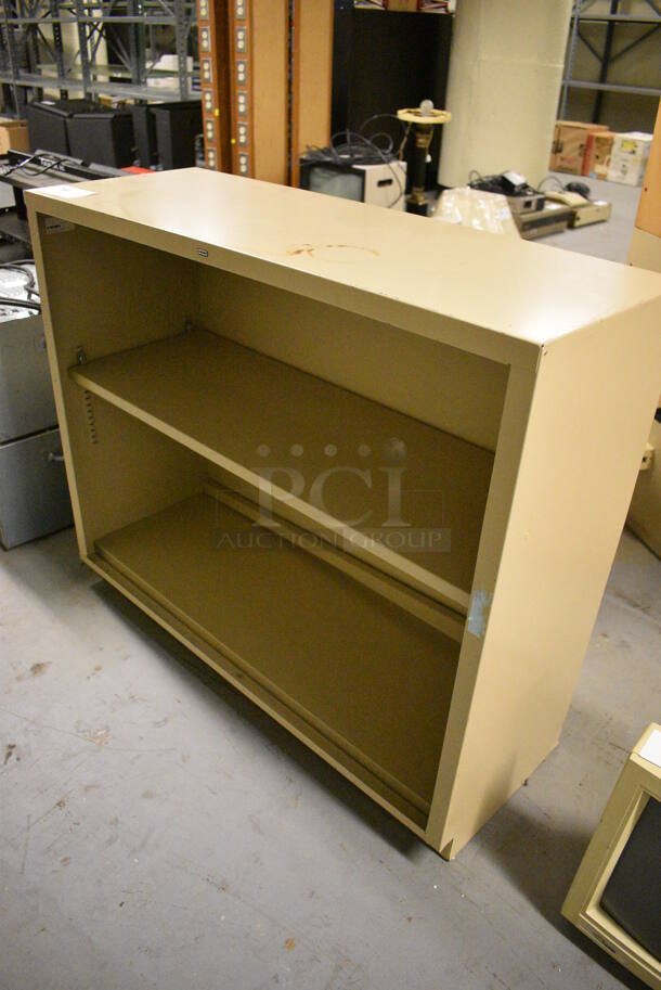 Tan Metal Bookshelf. 34.5x12.5x29. (south basement 012) - Image 2 of 3
