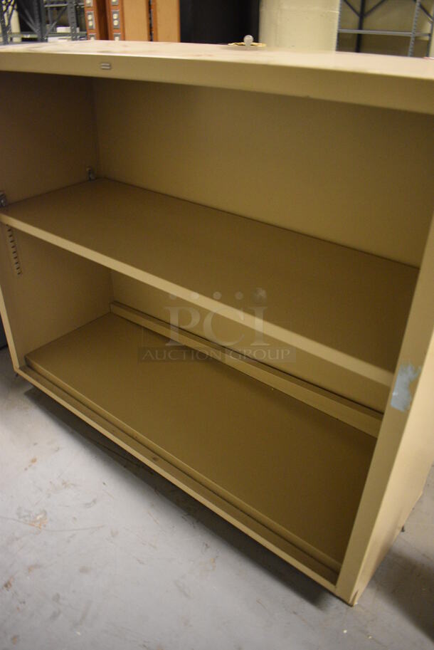 Tan Metal Bookshelf. 34.5x12.5x29. (south basement 012) - Image 3 of 3