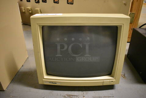 Swan 13" Computer Monitor. (south basement 012)