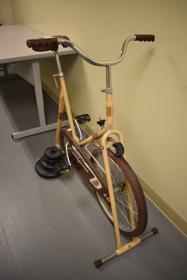 DP Pacer Metal Exercise Bicycle, Two 2.5 Pound Weight Plate, Olympic 5 Pound Weight Plate and Olympic 10 Pound Weight Plate. 24x43x40. (south basement hallway)