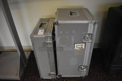 2 Gray Cases. 29x17x14.5, 25x18.5x8. 2 Times Your Bid! (room 204)