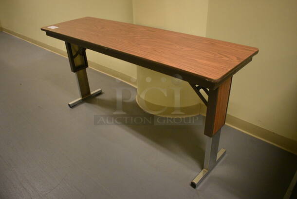 Wood Pattern Table. 60x18x29. (south basement hallway)