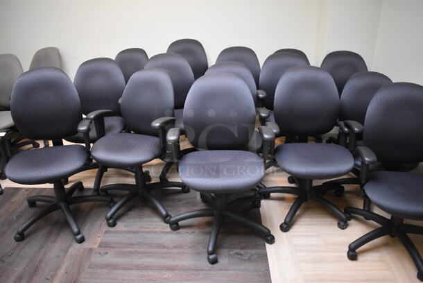 15 Office Chairs w/ Arm Rests on Casters. Includes 24x23x41. 15 Times Your Bid! (corridor outside 205)