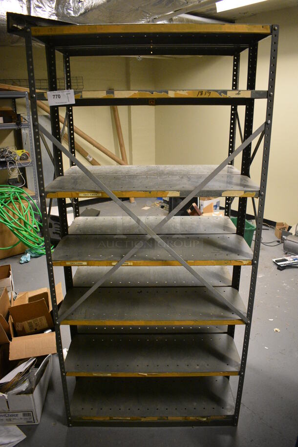 Gray Metal Shelving Unit. 36x24x75. (south basement 018)