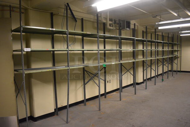 ALL ONE MONEY! Lot of Metal Shelving Unit; 11 Sections. BUYER MUST REMOVE: Give Yourself Ample Time To Remove This Item on Pick Up Day. 400x24x97. (north basement 004c)