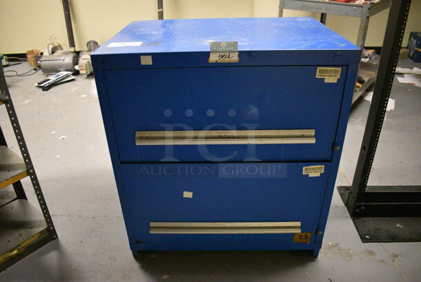 Blue Metal 2 Drawer Filing Cabinet. 30x22x33. (south basement 018)