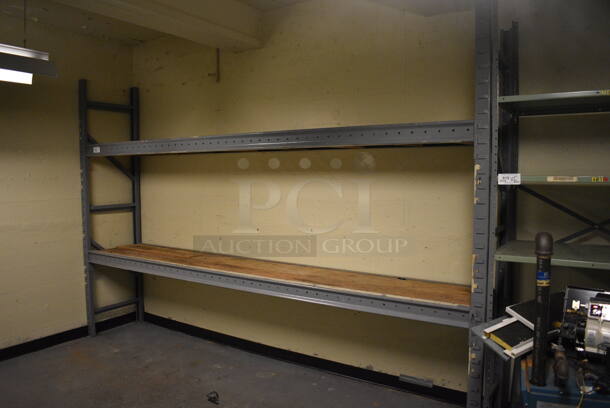 ALL ONE MONEY! Lot of Metal Shelving Unit w/ 2 Wooden Shelves. BUYER MUST REMOVE: Give Yourself Ample Time To Remove This Item on Pick Up Day. 144x25x97. (north basement 004c)
