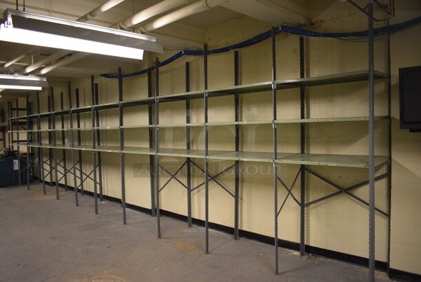 ALL ONE MONEY! Lot of Metal Shelving Unit; 11 Sections. BUYER MUST REMOVE: Give Yourself Ample Time To Remove This Item on Pick Up Day. 400x24x97. (north basement 004c)