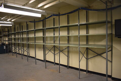 ALL ONE MONEY! Lot of Metal Shelving Unit; 11 Sections. BUYER MUST REMOVE: Give Yourself Ample Time To Remove This Item on Pick Up Day. 400x24x97. (north basement 004c)