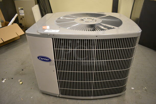 Carrier Model 38YKC030310 Metal Heat Pump. 208/230 Volts, 1 Phase. 35x30x26. (north basement 004e)