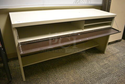 Tan Metal Table. 66.5x25.5x33.5. (room 211)